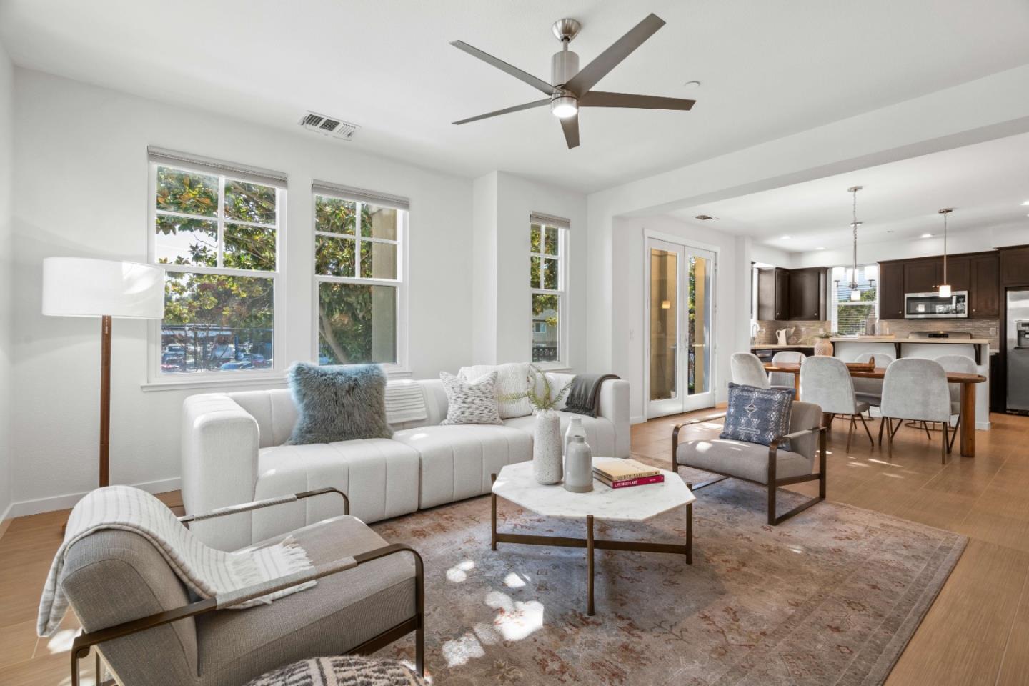 110 Calderon Avenue Mountain View, CA 94041 - Photo 7 of 25 a living room with furniture and a large window
