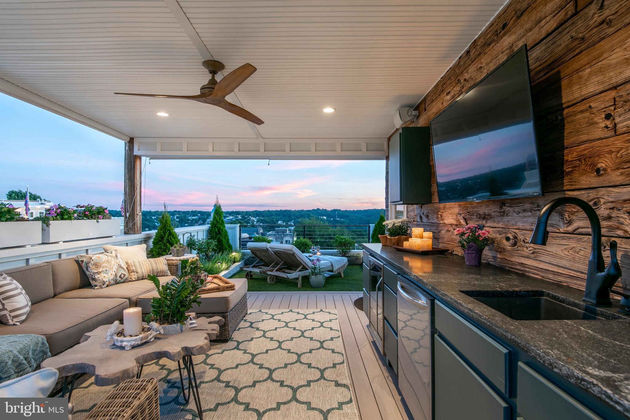 4726 Cross Street Philadelphia, PA 19128 - Photo 41 of 49 Rooftop Deck at dusk