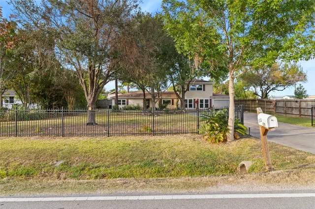 a view of swimming pool with a yard