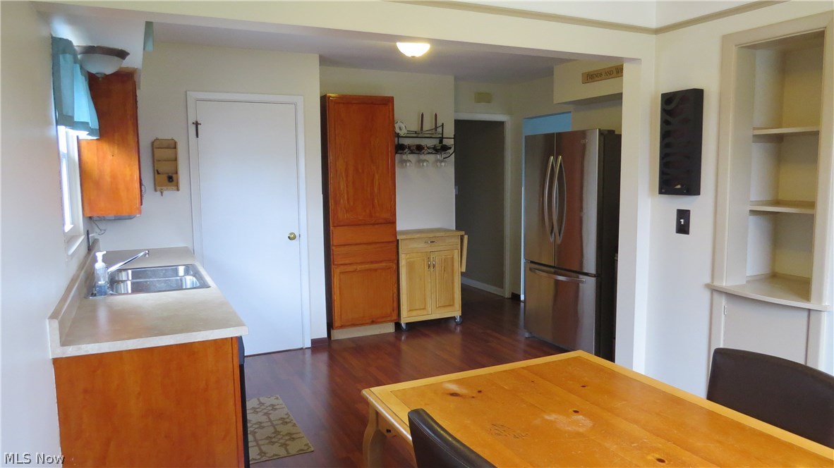 8321 Ackley Road Parma, OH 44129 - Photo 6 of 33 Newer flooring & appliances in neutral kitchen!