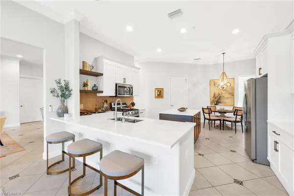 $599,999 | 3031 Marengo Court, Unit 203, Naples, FL 34114