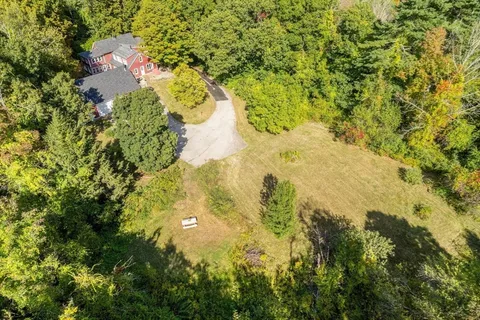 a view of a lake with a yard