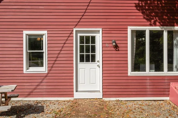 a view of a brick house with front door