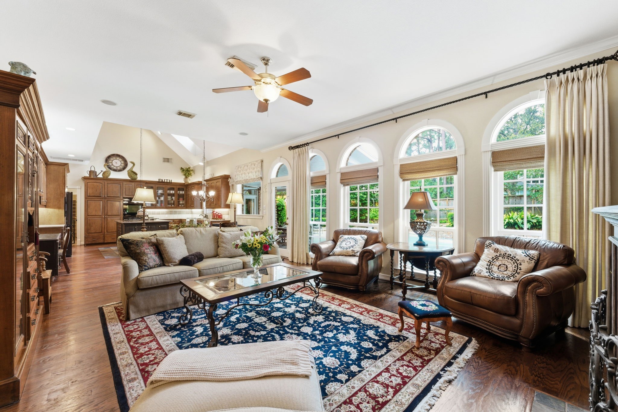 147 North Taylor Point Drive Spring, TX 77382 - Photo 13 of 44 High ceilings and a wall of windows looking out to the backyard oasis makes this the perfect entertaining space!