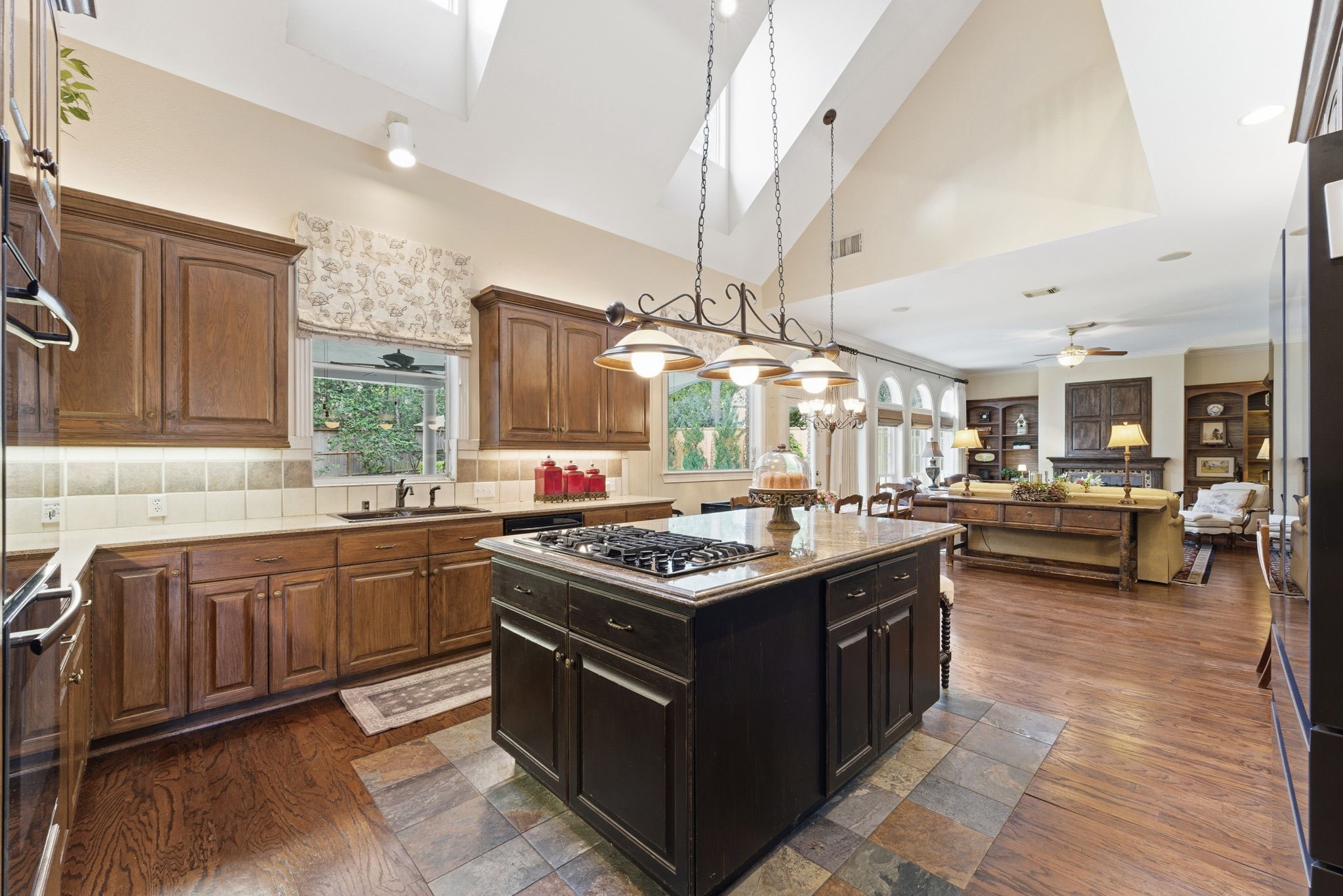 147 North Taylor Point Drive Spring, TX 77382 - Photo 15 of 44 Kitchen island with gas stove top.