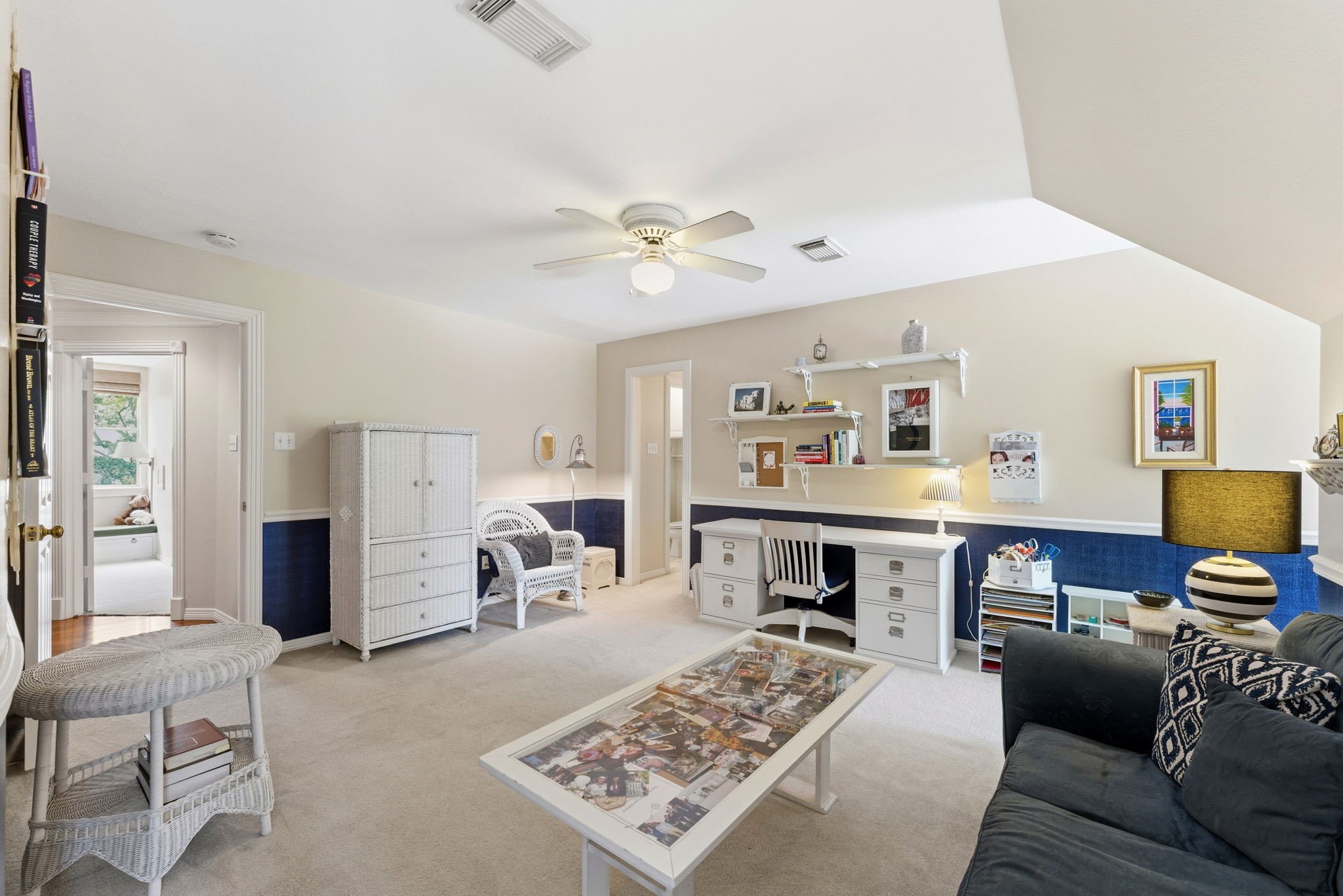 147 North Taylor Point Drive Spring, TX 77382 - Photo 25 of 44 The first upstairs spacious bedroom, currently serves as an inspiring office space, offering versatile potential to suit your lifestyle needs.