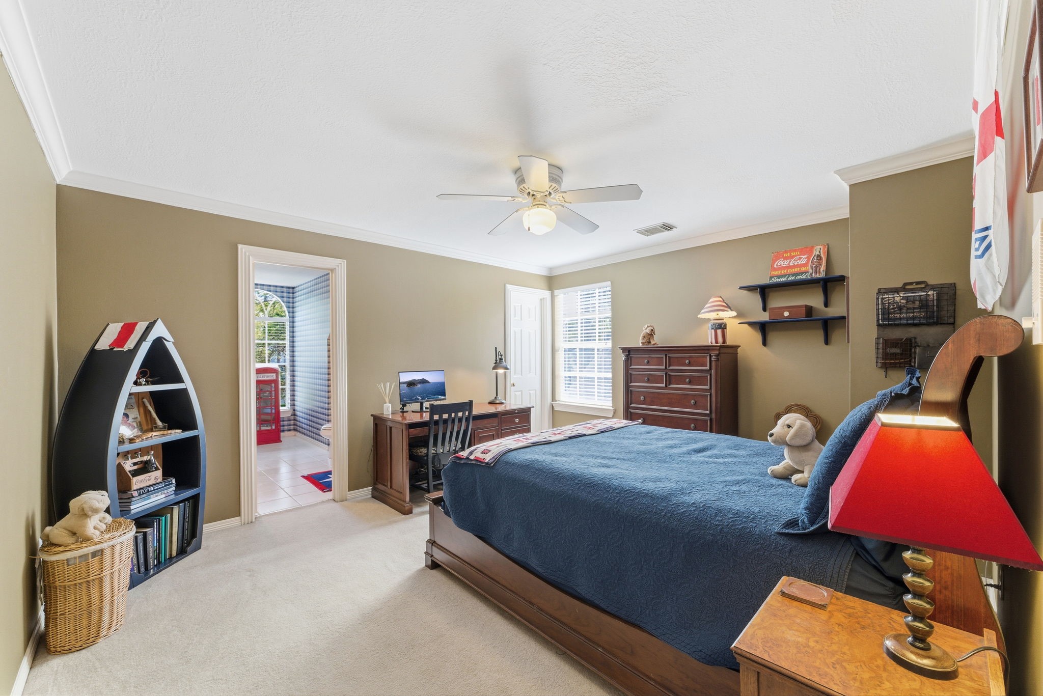 147 North Taylor Point Drive Spring, TX 77382 - Photo 33 of 44 This spacious 4th bedroom offers a serene retreat with ample room for relaxation and personalization, complemented by a beautifully finished ensuite bathroom featuring elegant cabinetry and modern fixtures.