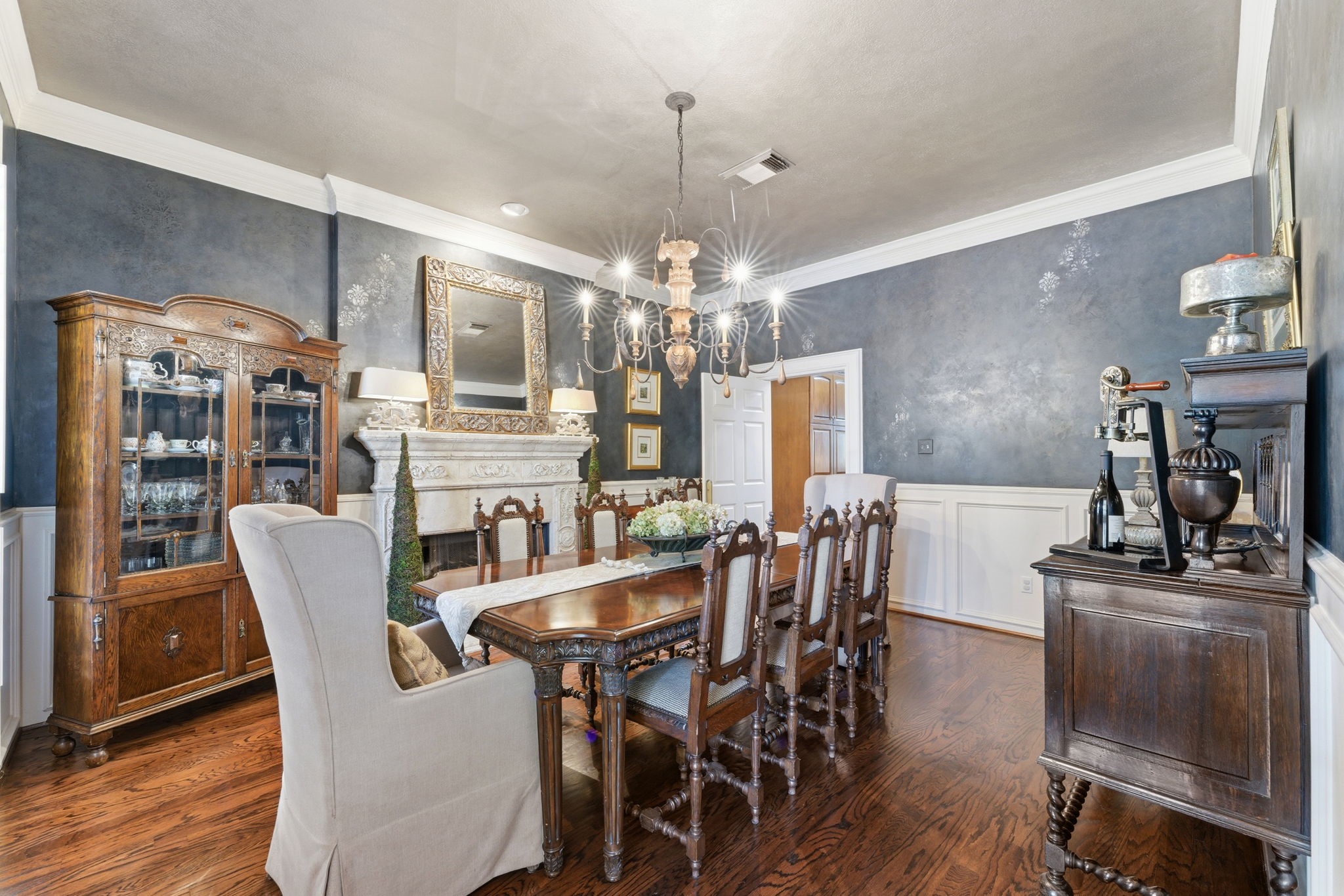 147 North Taylor Point Drive Spring, TX 77382 - Photo 10 of 44 Updated dining room complete with fireplace, faux painted walls and light fixture.