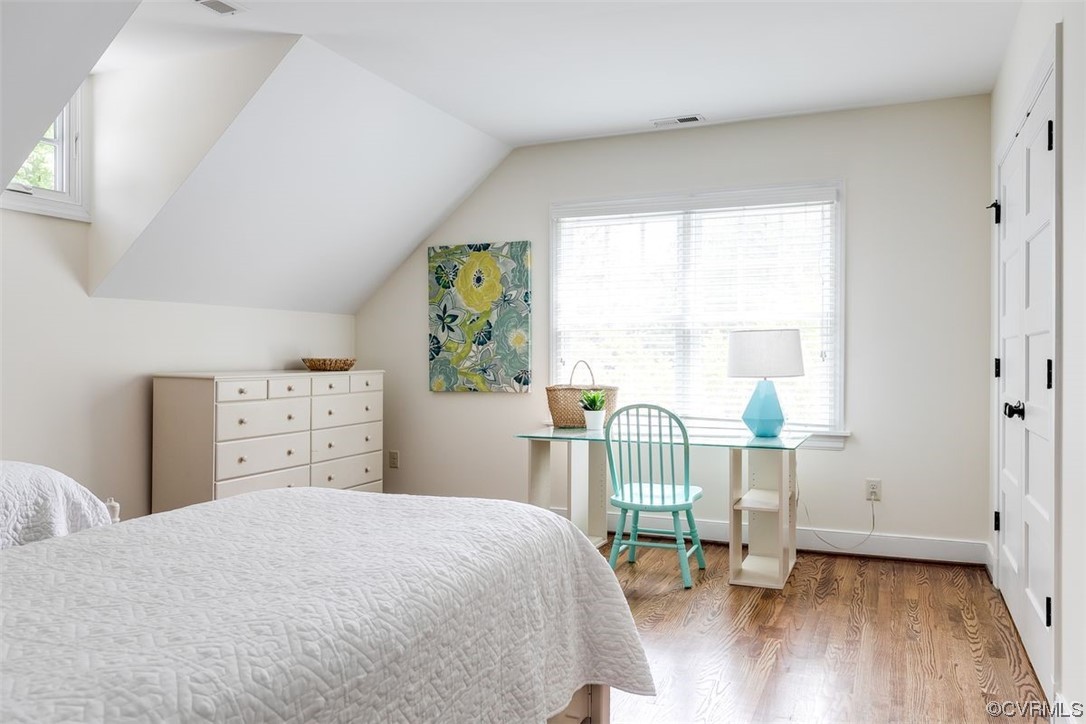 213 Culpepper Road Henrico, VA 23229 - Photo 32 of 46 a bedroom with a bed and a chair