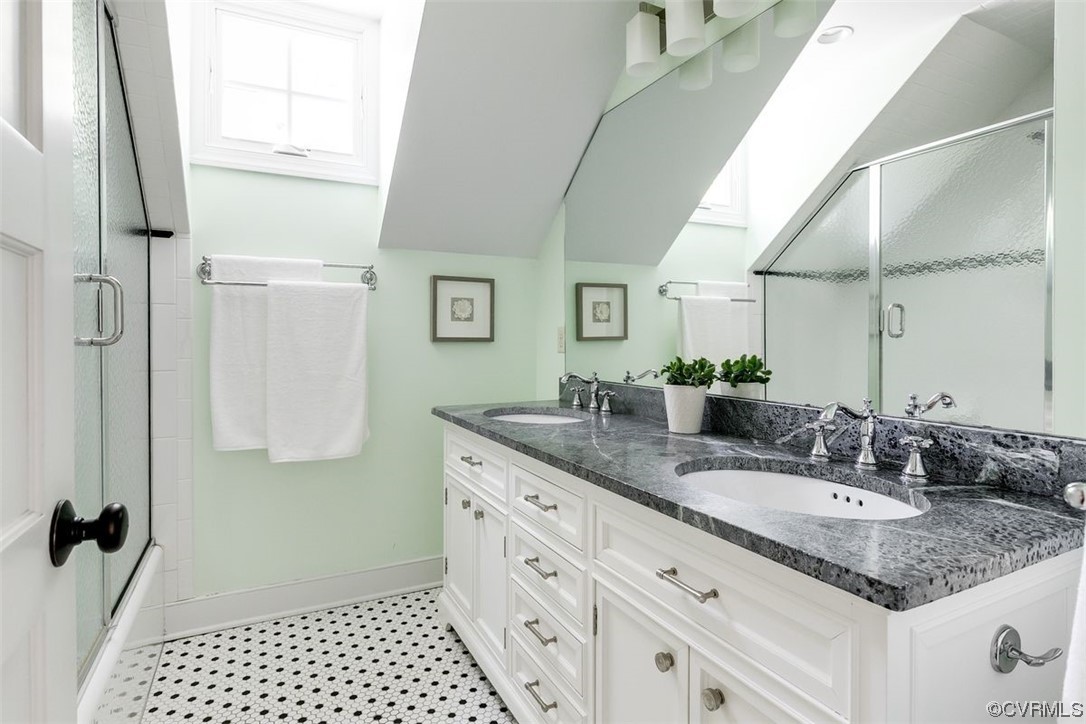 213 Culpepper Road Henrico, VA 23229 - Photo 34 of 46 a bathroom with a granite countertop sink and a mirror