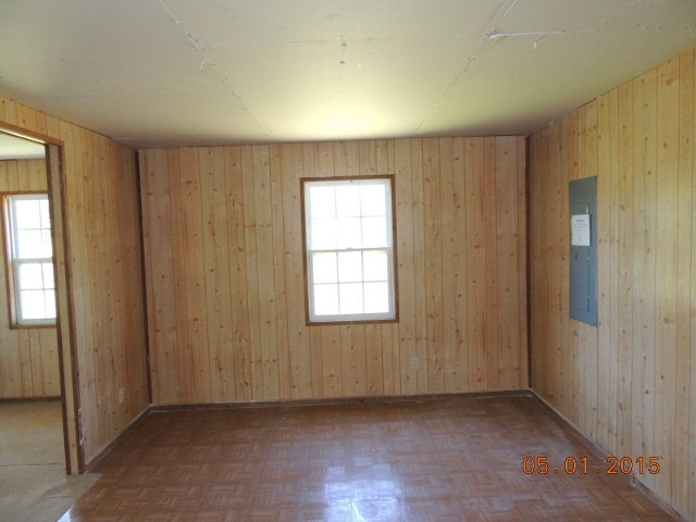 686 Tanglewood Road Fort Valley, GA 31030 - Photo 3 of 9 an empty room with windows