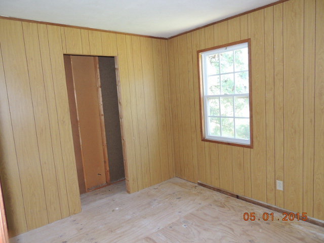 686 Tanglewood Road Fort Valley, GA 31030 - Photo 7 of 9 a view of an empty room with window and a bathroom