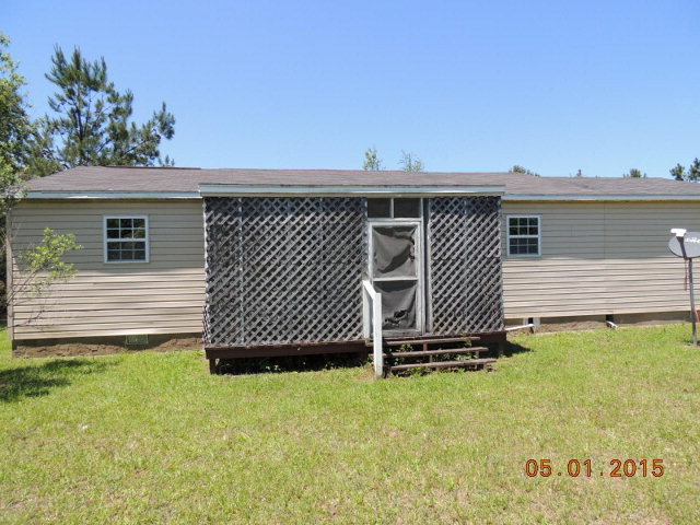 686 Tanglewood Road Fort Valley, GA 31030 - Photo 9 of 9 a view of a backyard