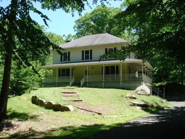 31 Mallory Hill Road Ridgefield, CT 06877 - Photo 1 of 1 a house view with a garden space