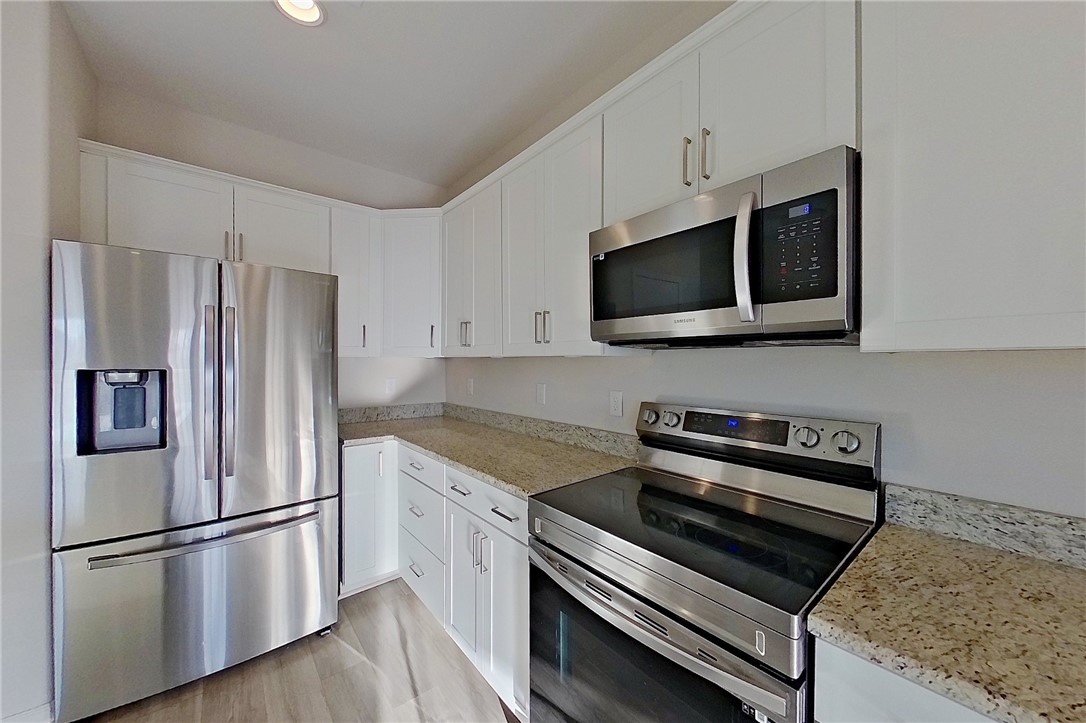 247 Chestnut Drive Brunswick, GA 31523 - Photo 15 of 49 Stainless Steel Appliances in Kitchen