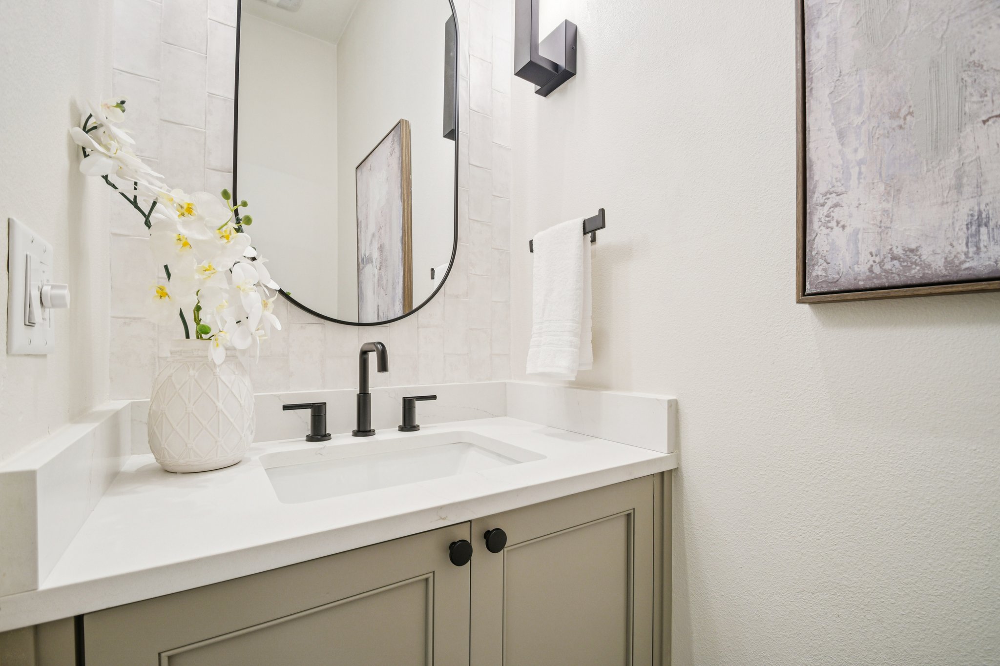 2518 Watkins Way Austin, TX 78746 - Photo 5 of 28 a bathroom with a sink and a mirror