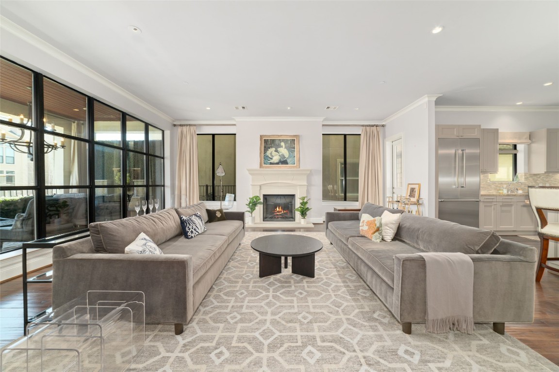 2221 Welch Street, Unit 201 Houston, TX 77019 - Photo 1 of 49 Welcome to 2221 Welch #201. A masterclass in European-inspired elegance, this single-level condo was designed to exude comfort, luxury, and convenience.
