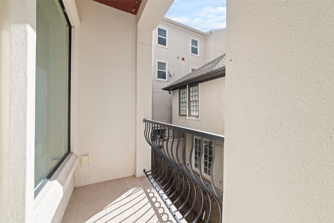 2221 Welch Street, Unit 201 Houston, TX 77019 - Photo 11 of 49 This suite's private, covered balcony allows for friends and family to feel a sense of privacy while enjoying morning coffee. One of three private, secluded urban terraces in this home.
