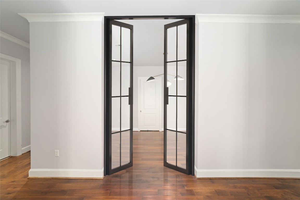 2221 Welch Street, Unit 201 Houston, TX 77019 - Photo 15 of 49 Virtually staged to show wrought-iron doors installed, converting this open room into an even more private sanctuary.