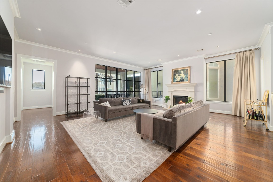 2221 Welch Street, Unit 201 Houston, TX 77019 - Photo 28 of 49 a living room with furniture and a fireplace