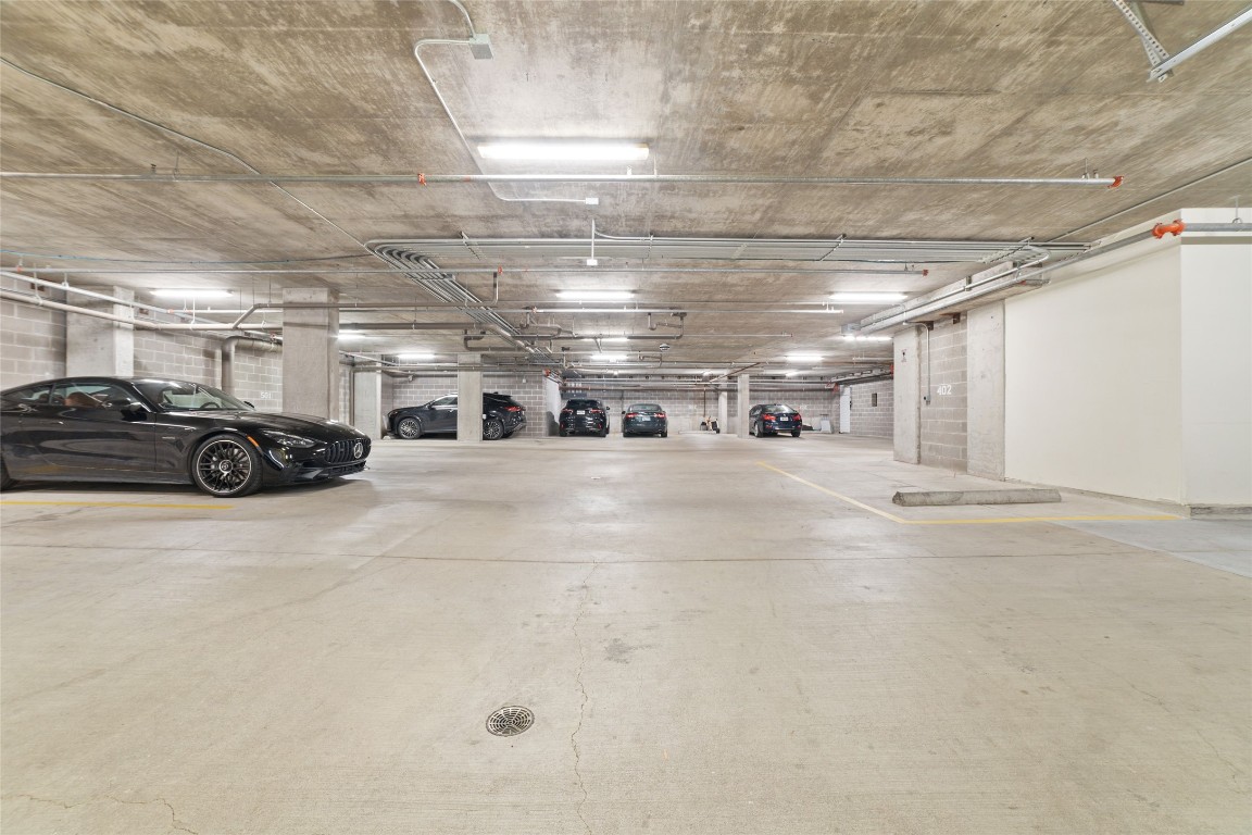 2221 Welch Street, Unit 201 Houston, TX 77019 - Photo 44 of 49 a car parked in parking area
