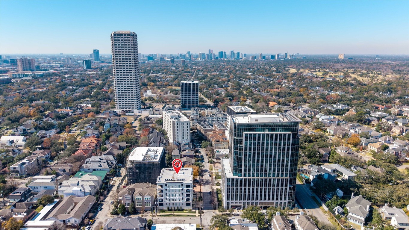 2221 Welch Street, Unit 201 Houston, TX 77019 - Photo 46 of 49 A wider aerial view showcases the home’s prime Inner Loop location, just moments from major corridors like Kirby, San Felipe, and Shepherd. With effortless access to some of Houston’s best shopping, dining, and everyday conveniences, this setting offers both connectivity and an elevated urban lifestyle. Easy access to all freeways.
