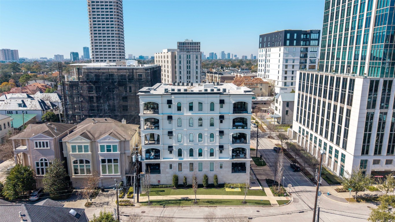 2221 Welch Street, Unit 201 Houston, TX 77019 - Photo 48 of 49 a front view of a multi story building