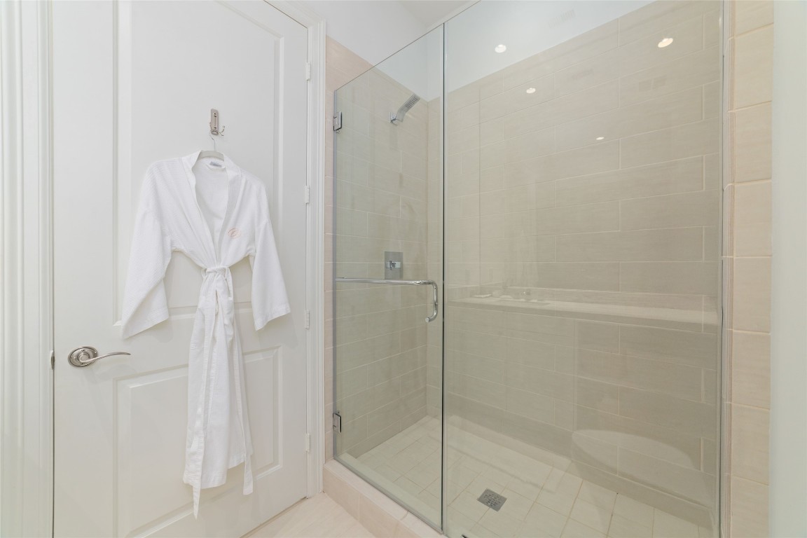 2221 Welch Street, Unit 201 Houston, TX 77019 - Photo 10 of 49 a bathroom with a shower