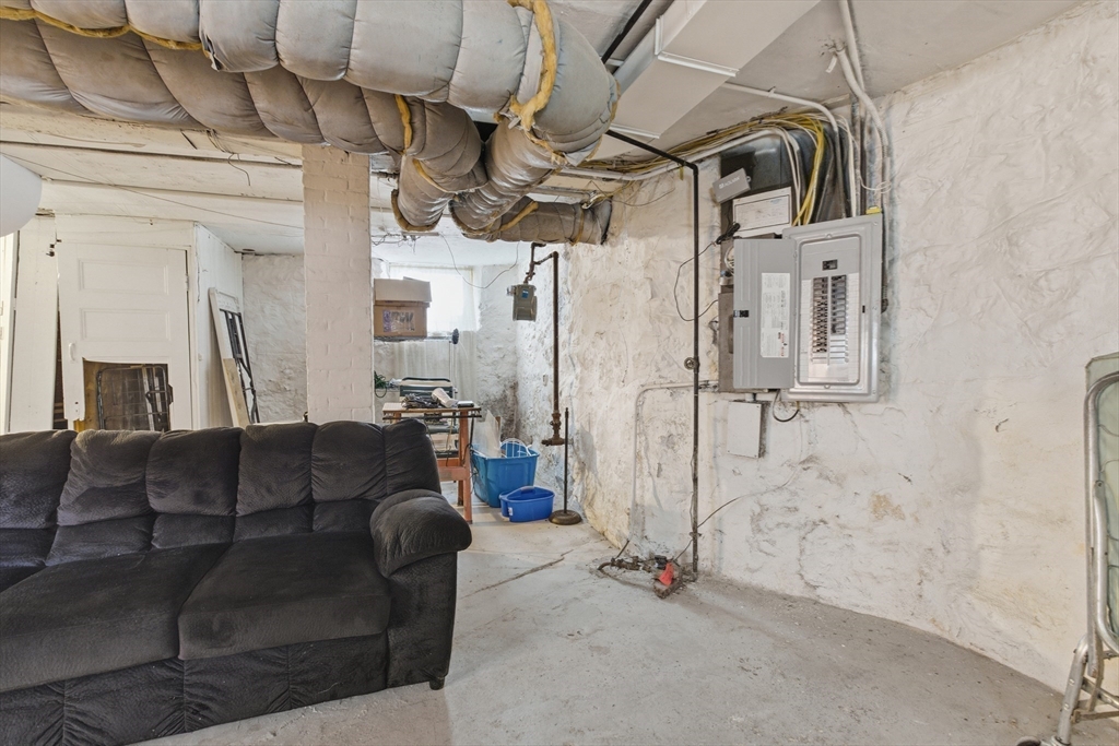 35 Algonquin Street Boston, MA 02124 - Photo 30 of 32 a living room with furniture