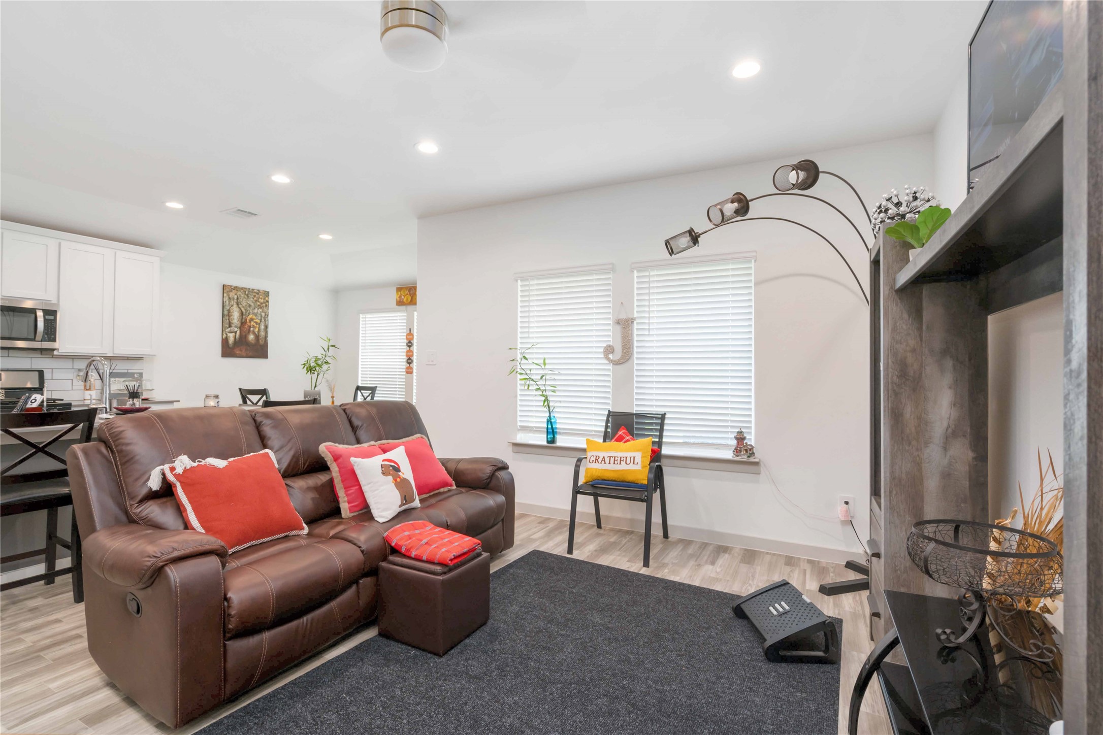 7730 Robert Rosharon, TX 77583 - Photo 5 of 18 The dining area offers a light-filled setting for meals, with backyard views and seamless access to the kitchen and living spaces.