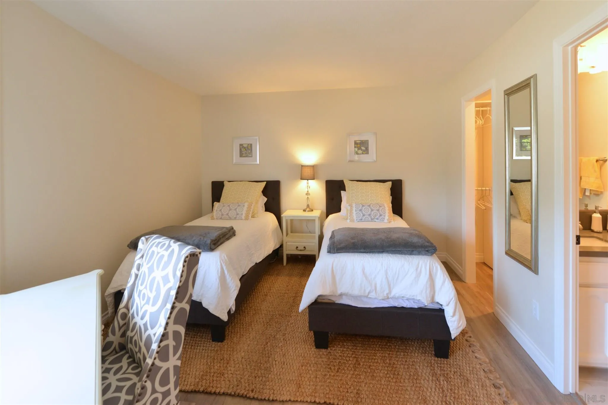 554 E Coronado, CA 92118 - Photo 6 of 13 a bedroom with two beds and wooden floor