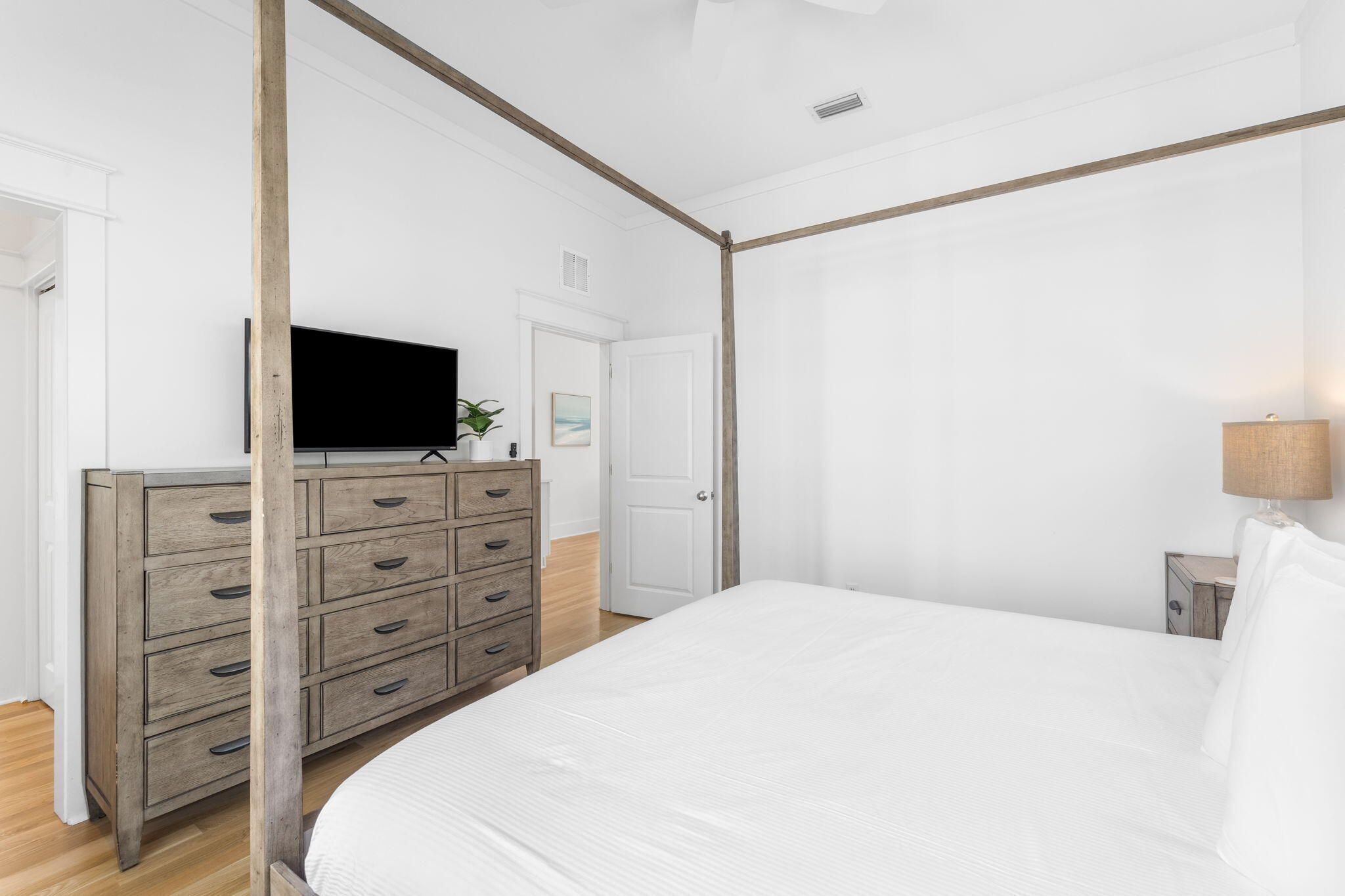 30 Chelsea Loop Road Santa Rosa Beach, FL 32459 - Photo 19 of 67 a bedroom with a bed and a flat screen tv