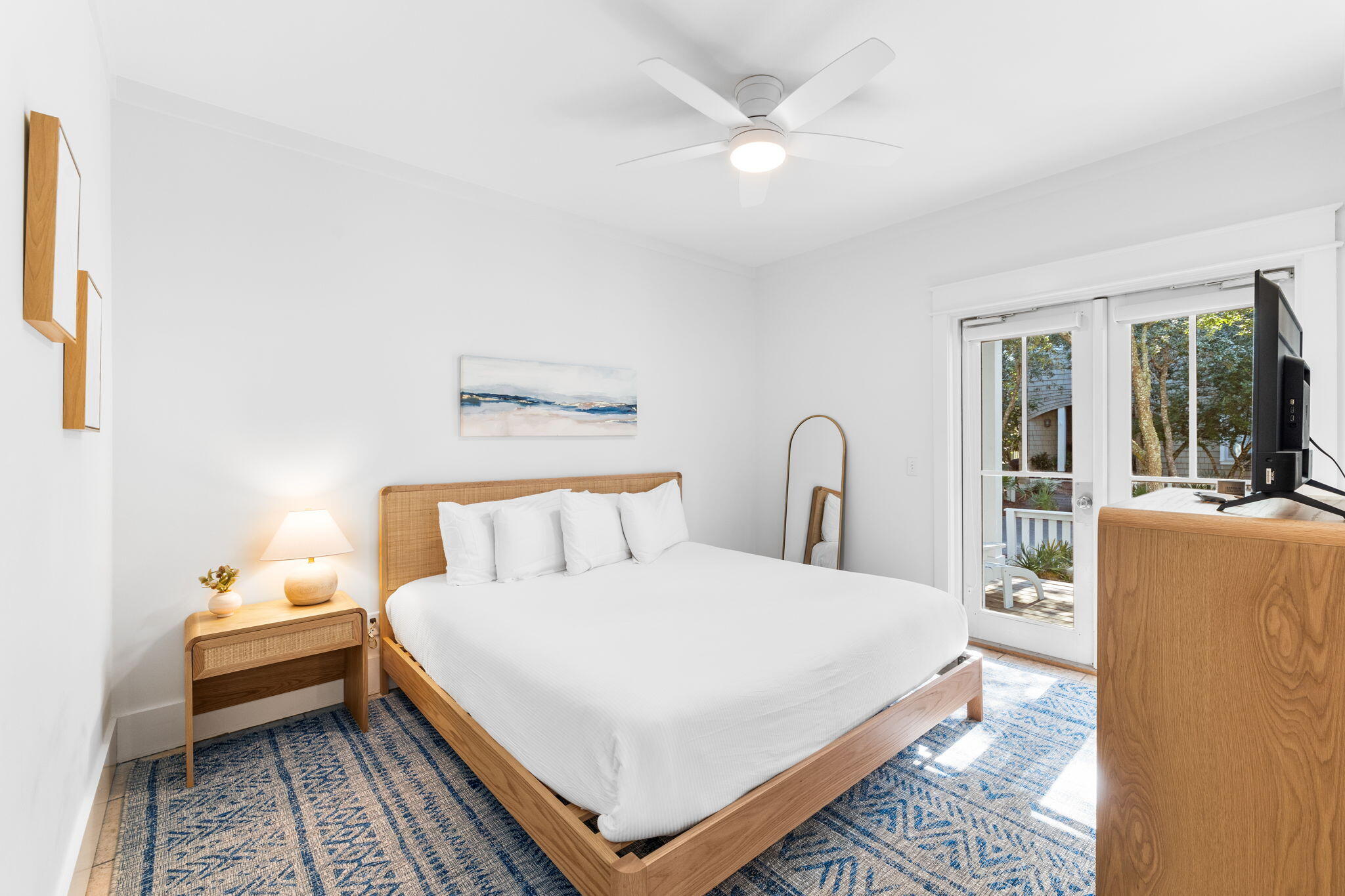 30 Chelsea Loop Road Santa Rosa Beach, FL 32459 - Photo 22 of 67 a bedroom with a bed and a chandelier