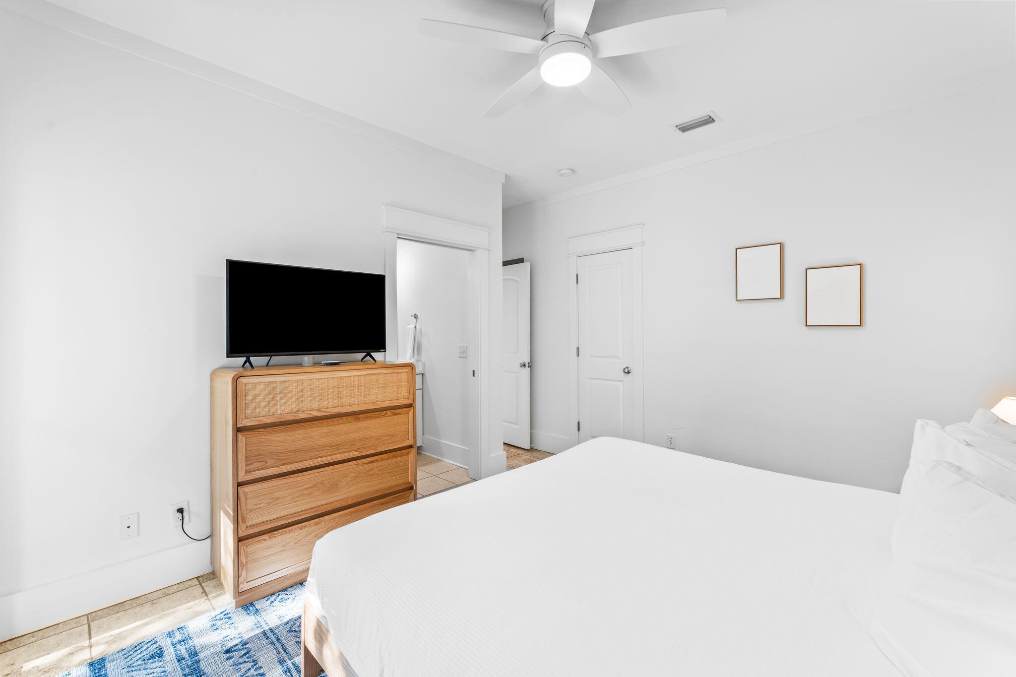 30 Chelsea Loop Road Santa Rosa Beach, FL 32459 - Photo 23 of 67 a bedroom with a bed and a flat screen tv