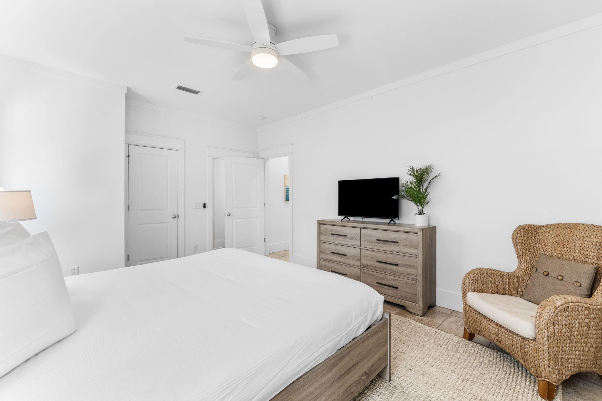 30 Chelsea Loop Road Santa Rosa Beach, FL 32459 - Photo 28 of 67 a bedroom with a bed and a couch