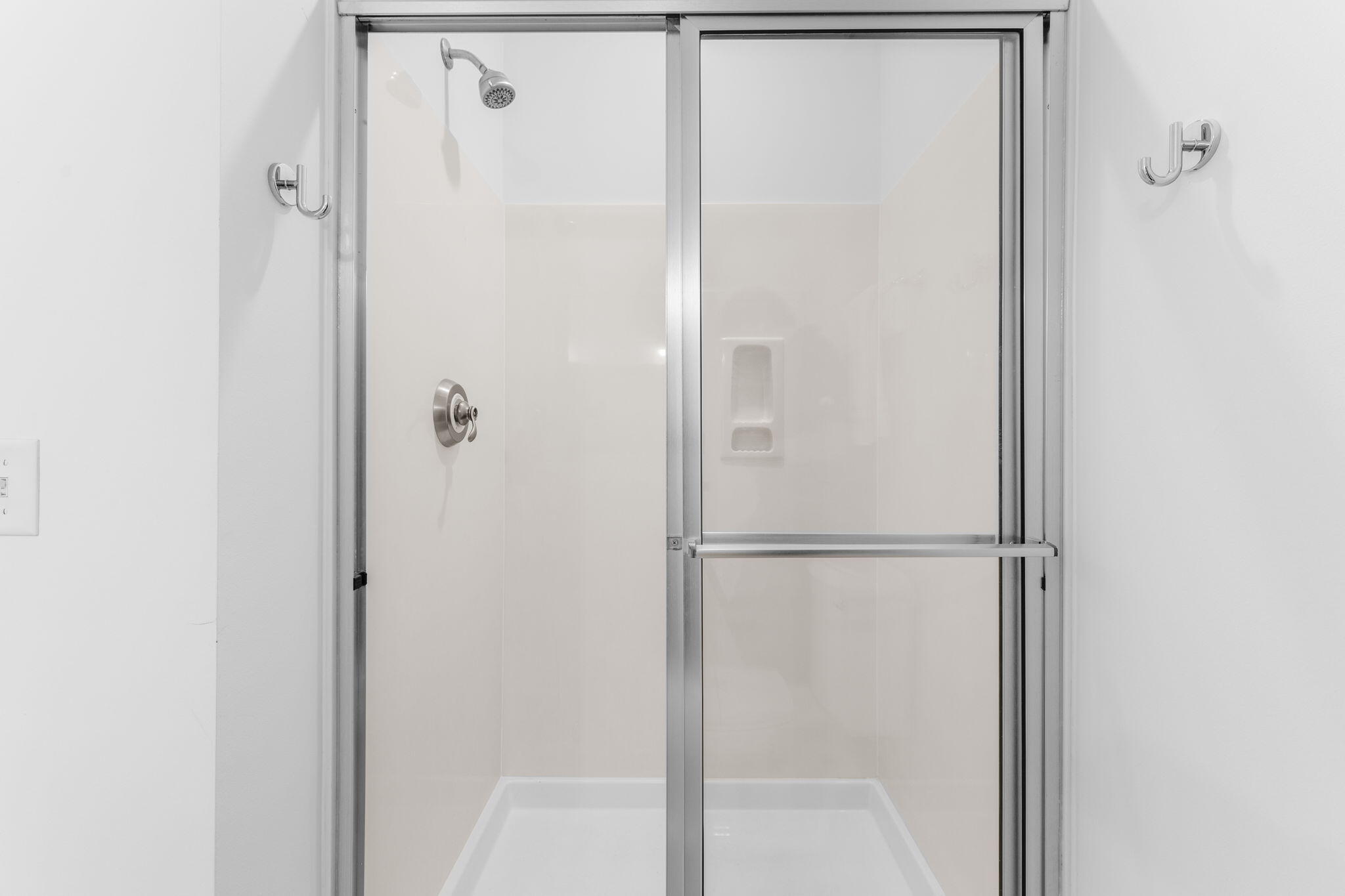 30 Chelsea Loop Road Santa Rosa Beach, FL 32459 - Photo 30 of 67 a bathroom with a glass shower door