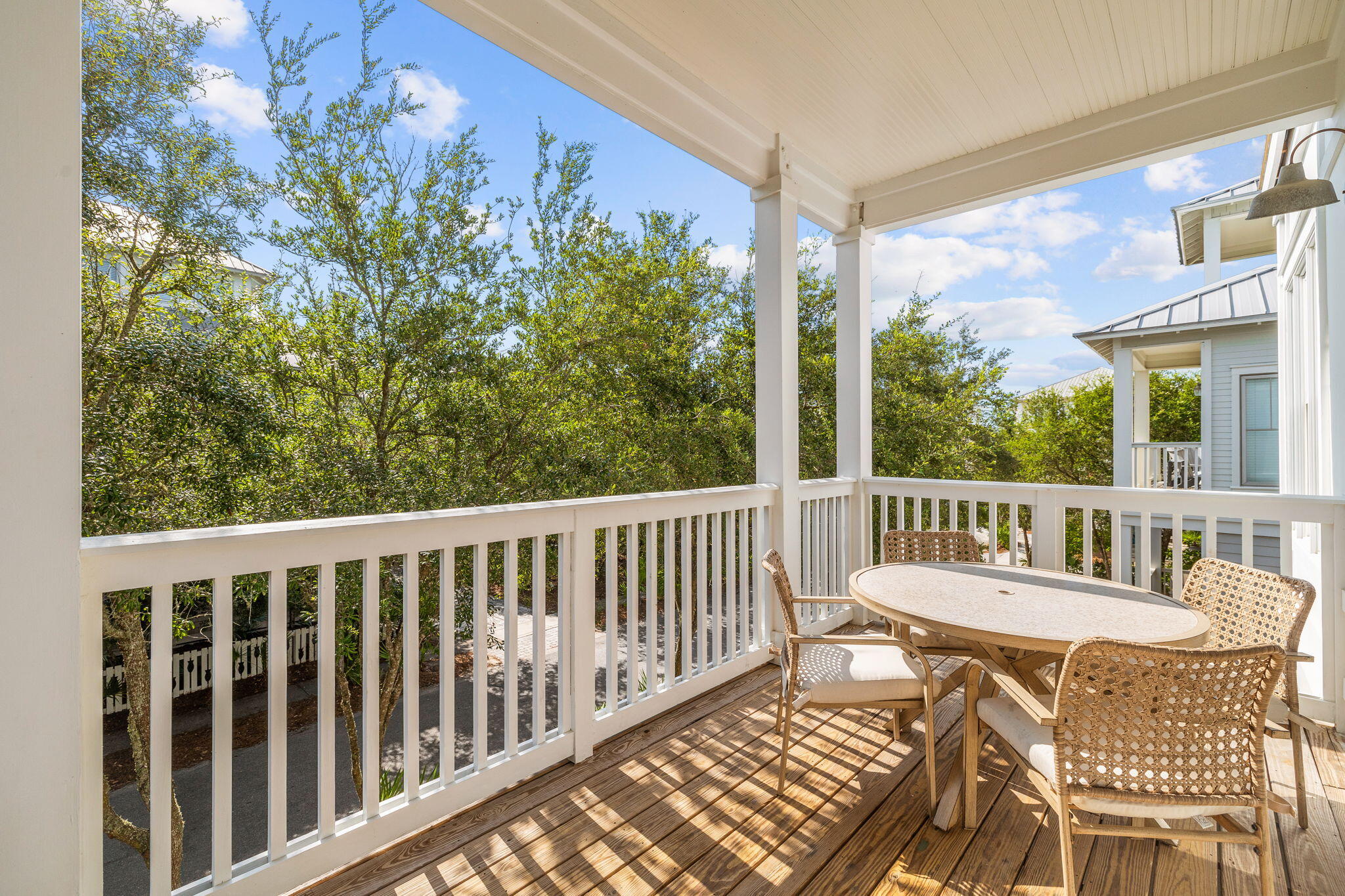 30 Chelsea Loop Road Santa Rosa Beach, FL 32459 - Photo 44 of 67 a view of a chair and table on the deck
