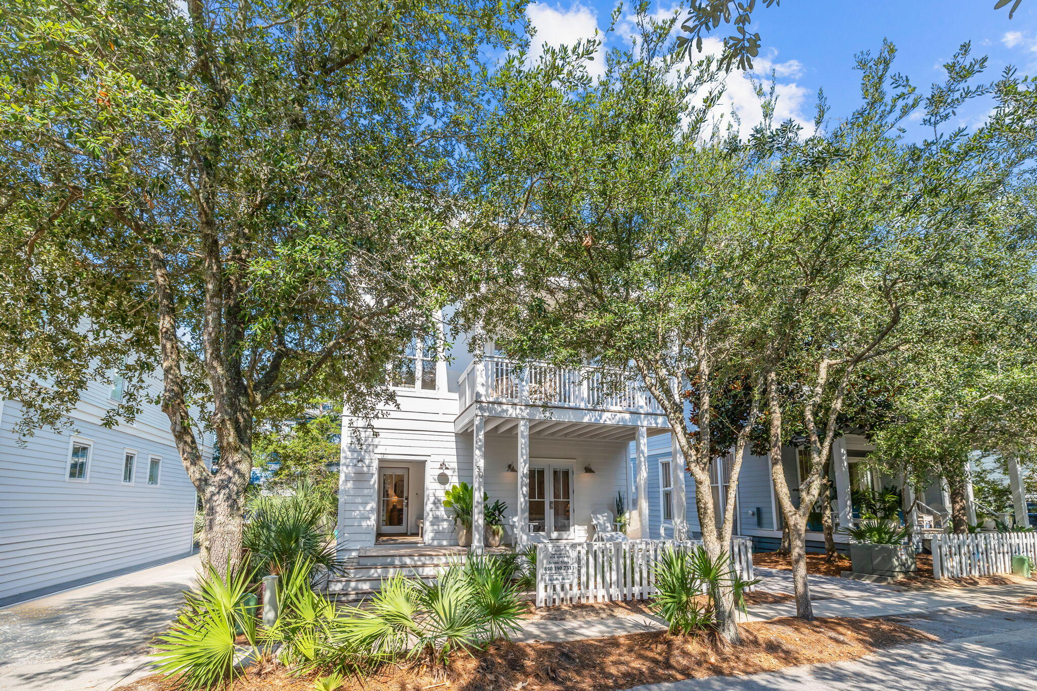 30 Chelsea Loop Road Santa Rosa Beach, FL 32459 - Photo 45 of 67 a front view of a house with garden