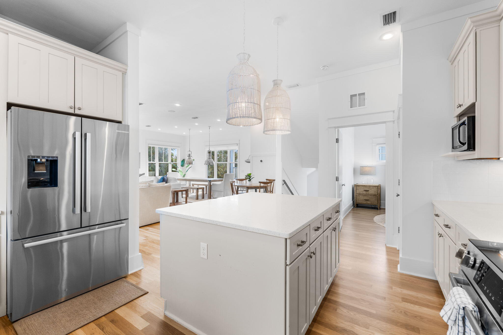 30 Chelsea Loop Road Santa Rosa Beach, FL 32459 - Photo 7 of 67 a kitchen with white cabinets and white appliances