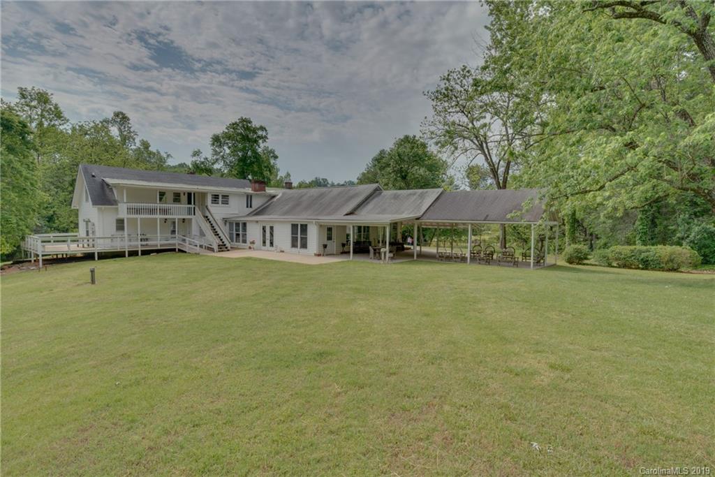 1264 Maple Creek Road Rutherfordton, NC 28139 - Photo 14 of 34 a house with swimming pool in front of it