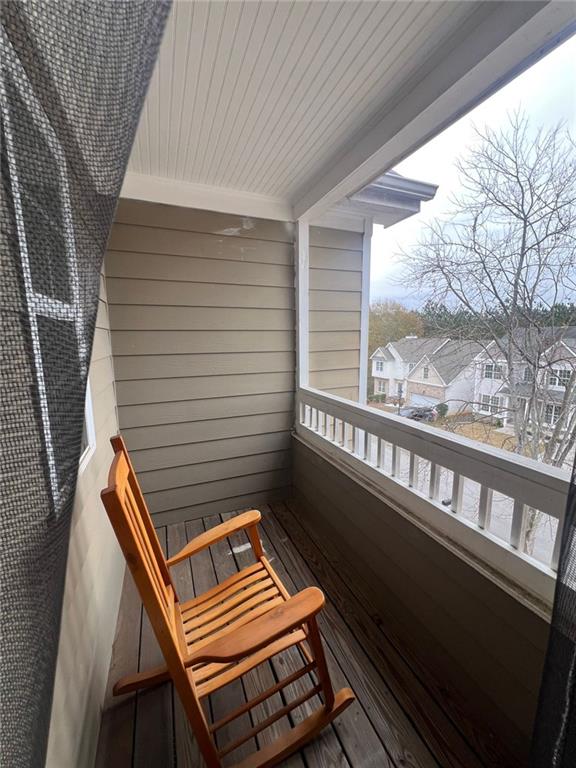 1530 Stewart Ridge Drive Buford, GA 30518 - Photo 19 of 26 a view of a balcony with wooden floor
