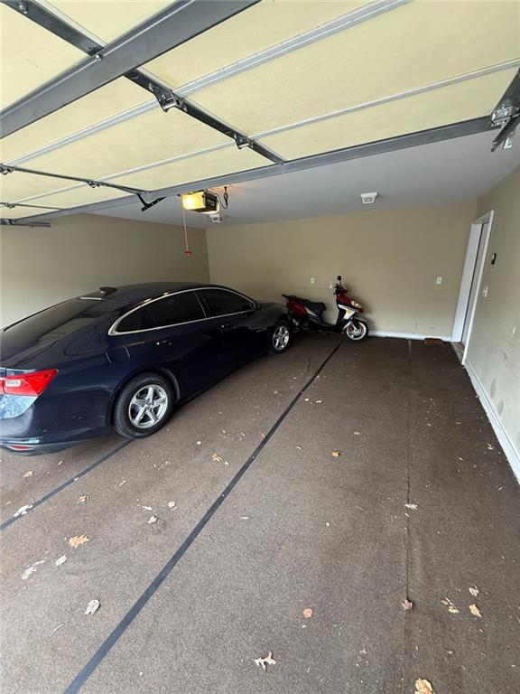 1530 Stewart Ridge Drive Buford, GA 30518 - Photo 26 of 26 a view of a car garage