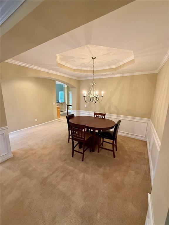 1530 Stewart Ridge Drive Buford, GA 30518 - Photo 4 of 26 a dining room with furniture and chandelier
