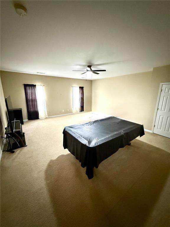 1530 Stewart Ridge Drive Buford, GA 30518 - Photo 10 of 26 a bedroom with bed and window