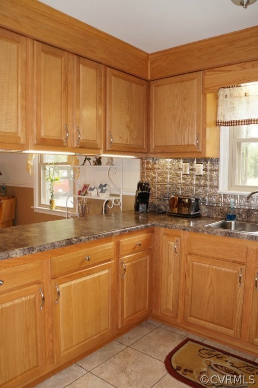581 Countyline Road Keysville, VA 23947 - Photo 5 of 23 a kitchen with stainless steel appliances granite countertop a sink a stove and white cabinets
