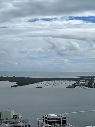 a view of a balcony with furniture