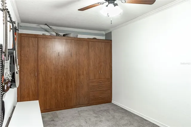 an empty room with a wooden door