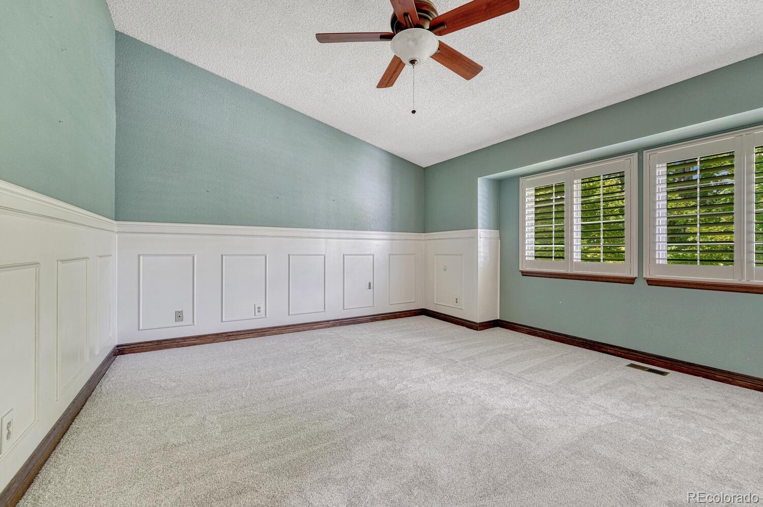 302 Northridge Road Highlands Ranch, CO 80126 - Photo 20 of 36 a view of an empty room with a window