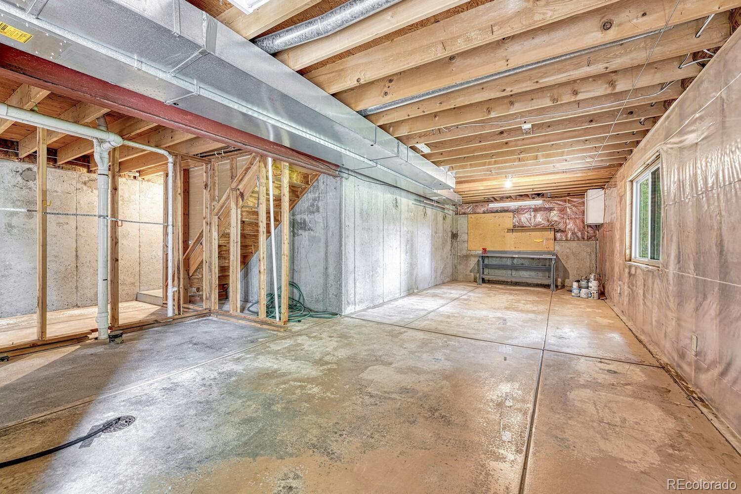 302 Northridge Road Highlands Ranch, CO 80126 - Photo 24 of 36 a view of garage with wooden floor