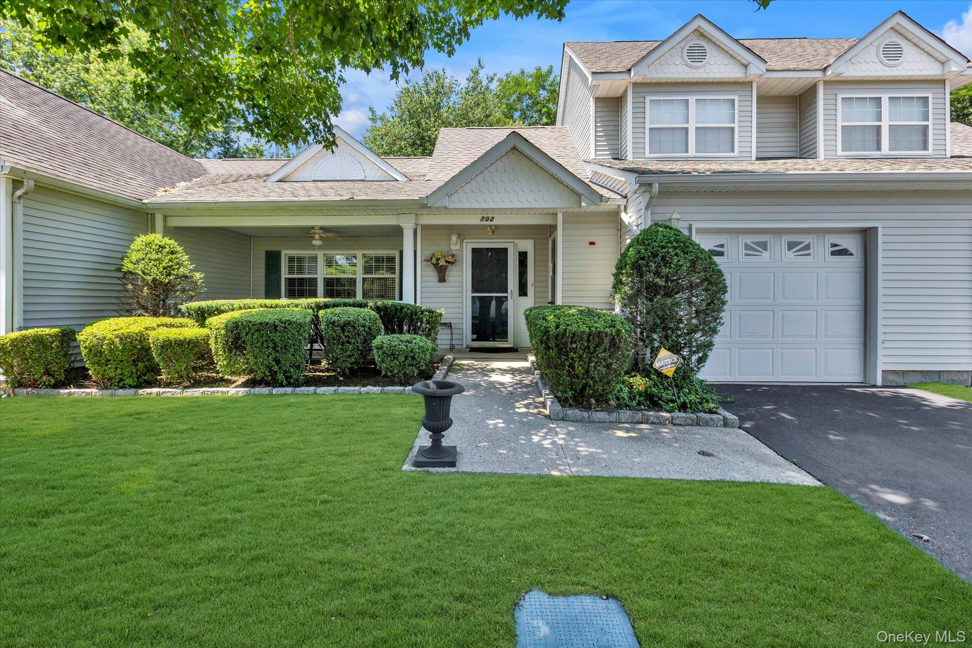 702 Pebble Beach Path Riverhead, NY 11901 - Photo 1 of 17 702 Pebble Beach Path ~ Welcome Home!